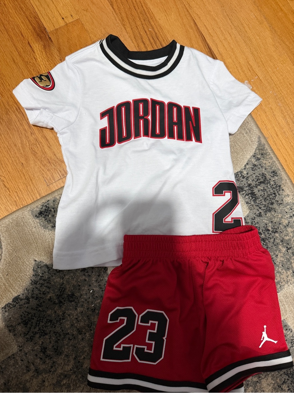 Jordan White Tee with Red and Black Accents & Red Shorts